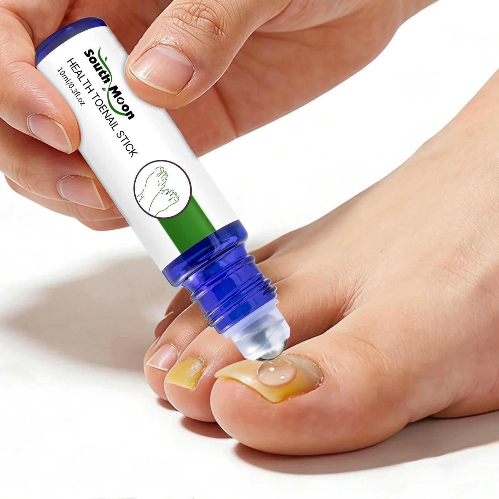 Applying toenail treatment stick to discolored toenail for nail care and fungus treatment