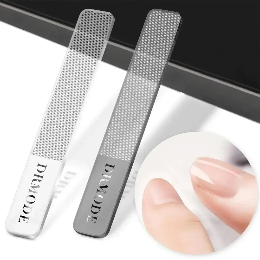 Two metal nail files with DRMODE text, close-up of neatly shaped fingernails