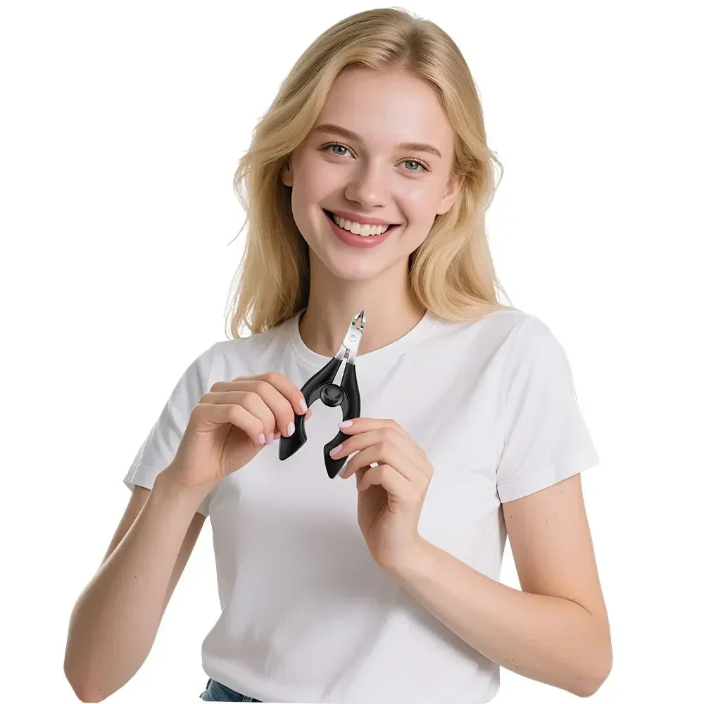 Smiling woman holding black ergonomic nail clippers against a white background