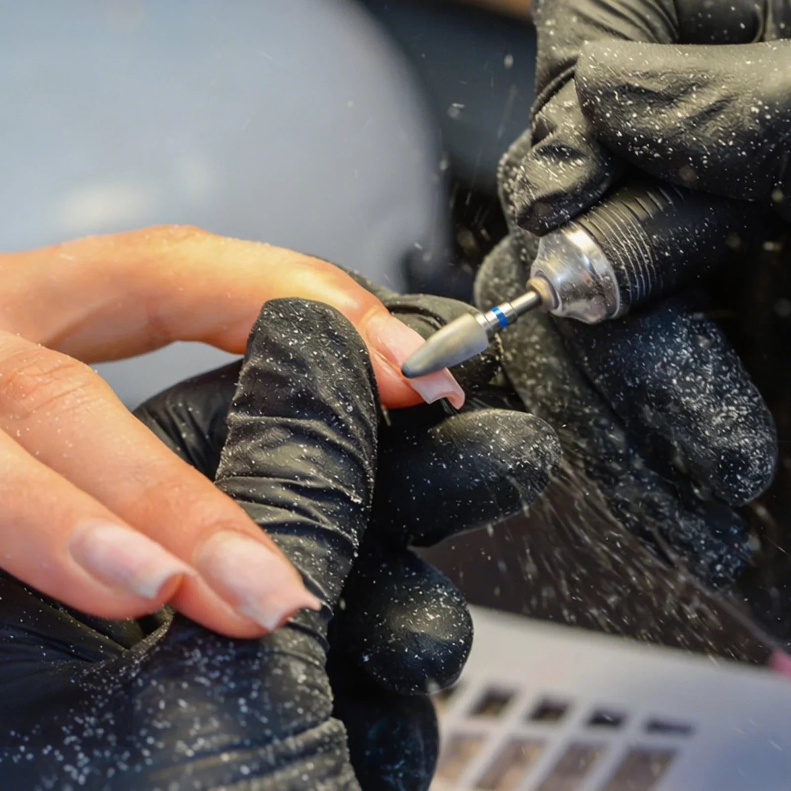 Traditional electric nail drill creates messy nail dust everywhere, hard to clean