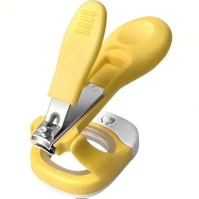 Yellow baby nail clippers with ergonomic handle and safety design on white background