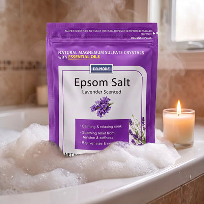 DRMODE Lavender Epsom Salt pouch sitting in a steamy bubble bath beside a glowing candle, creating a soothing ingrown toenail foot soak ritual.